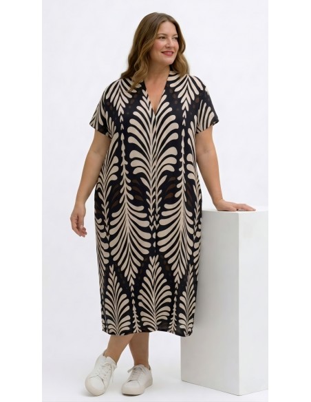Vestido midi tallas grandes estampado hojas blancas y negras para mujer curvy.